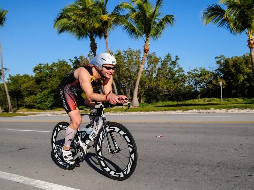 Peter Buniak cycling in a triathlon